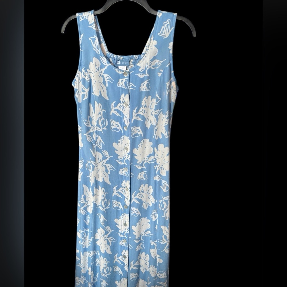 Women's white on blue floral dress. Buttons in front, smocked back ankle length